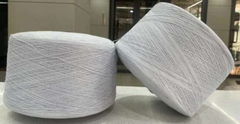 Polyester spun yarn cones